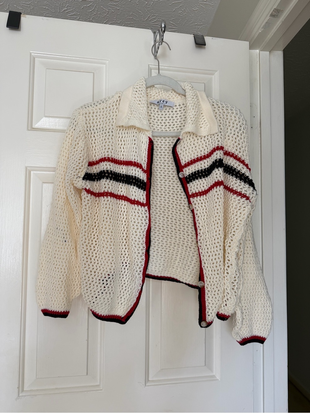 Cream Open-Knit Button Cardigan with Red & Black Stripe Trim